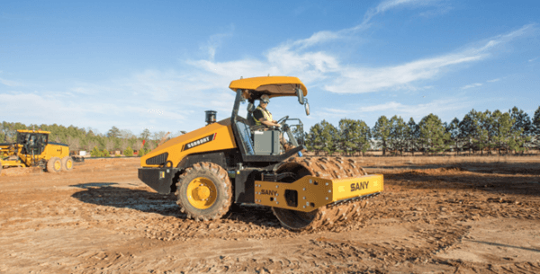 Man operating Compaction Roller