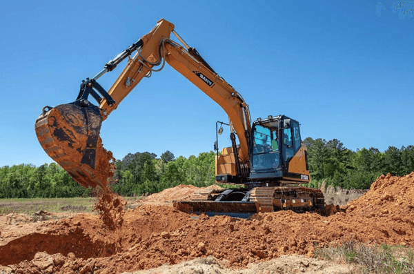 Excavator digging on site