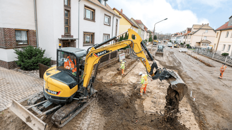 Excavator working on a road