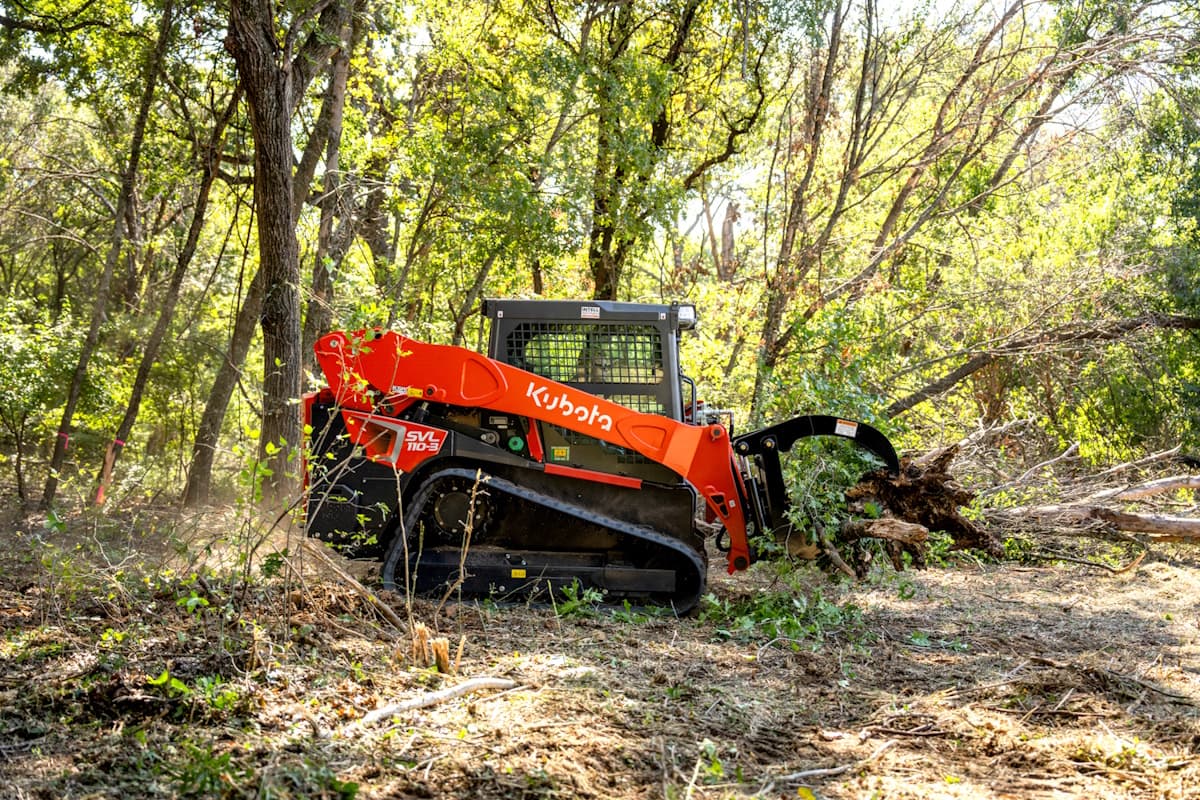 SVL110-3 carrying branches in a forest