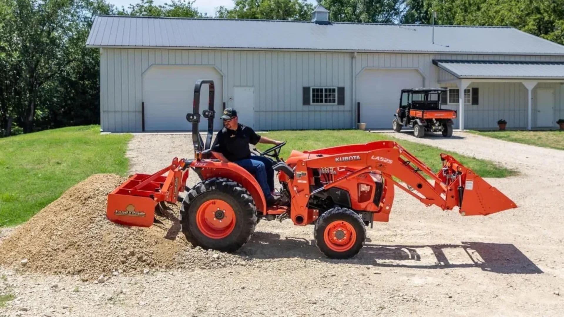 Kubota tractor with Land Pride BB12 Series box scraper at Union Farm Equipment